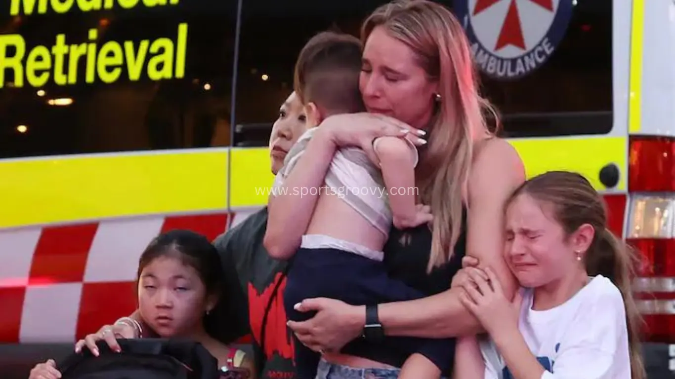 People are led out from the Westfield Shopping Centre where multiple people were stabbed in Sydney, Saturday, April 13, 2024. The Sydney Morning Herald reported that four people.