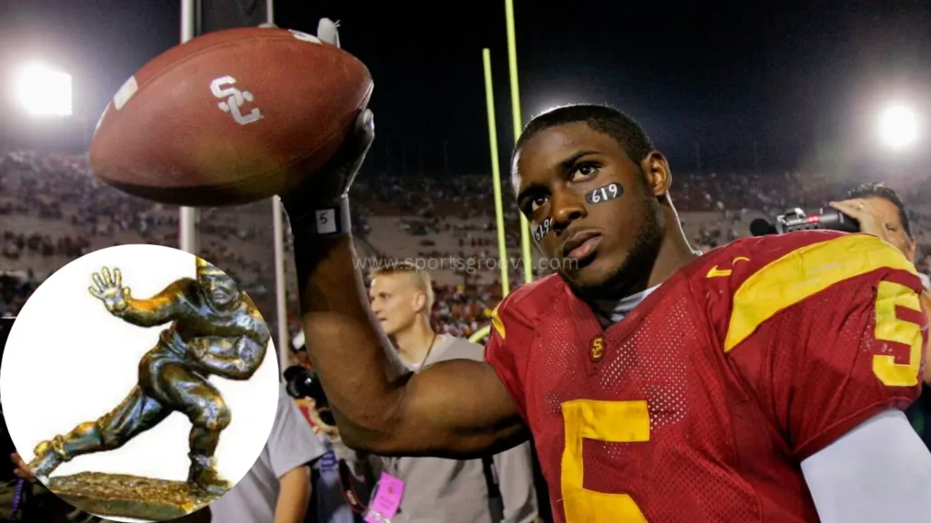 Bush leaps over UCLA defender Marcus Cassel during his time as a USC Trojan at the Los Angeles Memorial Coliseum, December 3, 2005.