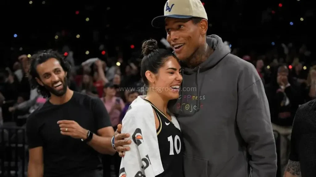 Darren Waller embraces Kelsey Plum of the Aces during the WNBA playoffs on Aug. 17, 2022, at Michelob ULTRA Arena in Las Vegas.