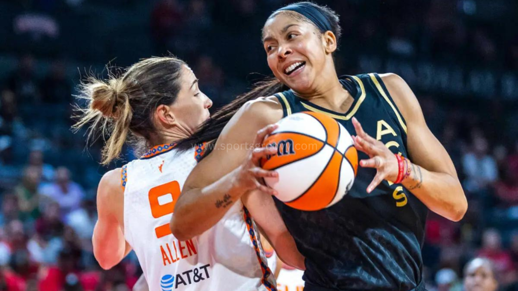 Las Vegas Aces forward Candace Parker (3) comes around the back of Connecticut Sun guard Rebecca Allen (9) to get to the basket during the second half of their WNBA game at the Michelob ULTRA Arena on Saturday.