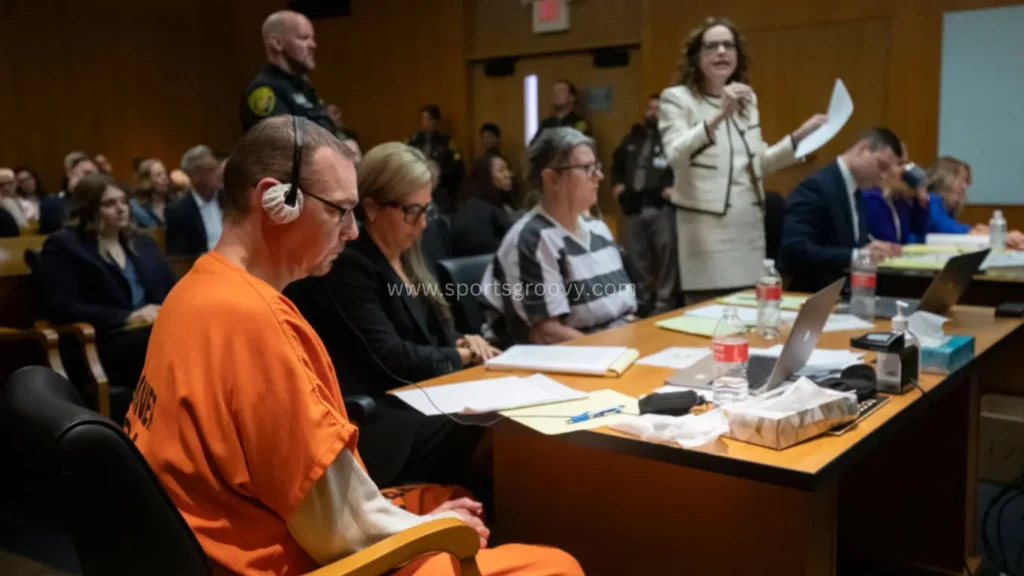 ames Crumbley, his attorney Mariell Lehman, Jennifer Crumbley, and her attorney Shannon Smith, sit in court.