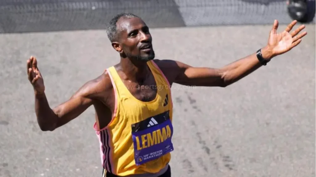 isay Lemma of Ethiopia celebrates taking first place in the men's professional field during the 128th Boston Marathon.