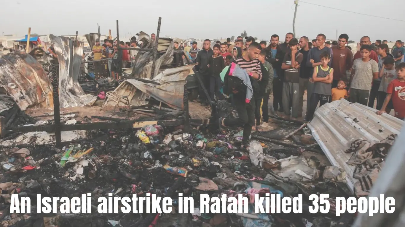 The aftermath of an Israeli strike in Rafah, Gaza Strip, leaves Palestinians gazing upon the wreckage where displaced individuals had sought shelter.