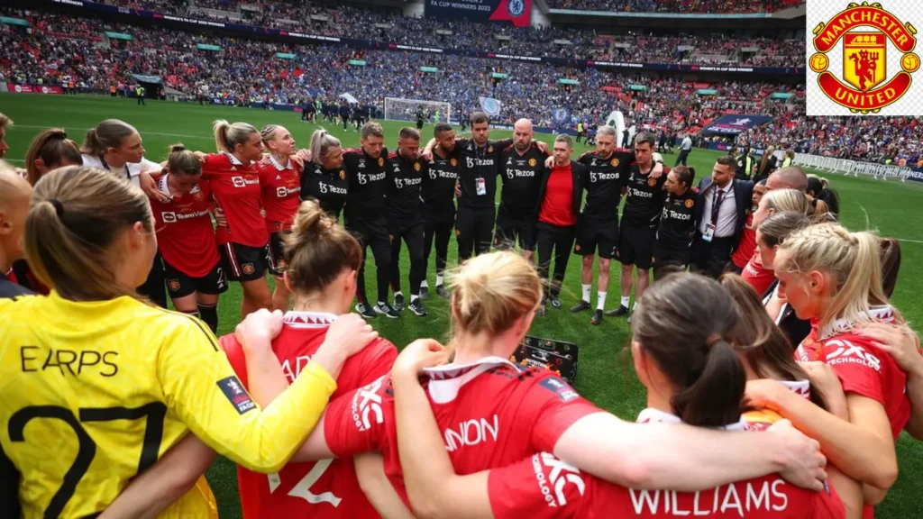 Marc Skinner speaks with his players after the Vitality Women's FA Cup.