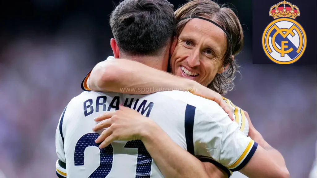 Real Madrid’s Brahim Diaz, right, celebrates with his teammate Real Madrid’s Luka Modric after scoring his side’s opening goal during the the Spanish La Liga soccer match between Real Madrid and Cadiz at the Santiago Bernabeu stadium in Madrid, Spain, Saturday, May 4, 2024.