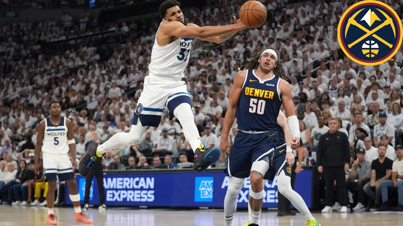 Minnesota Timberwolves center Karl-Anthony Towns (32) loses control of the ball during the first half of Game 4 of an NBA basketball second-round playoff series against the Denver Nuggets, Sunday, May 12, 2024, in Minneapolis.