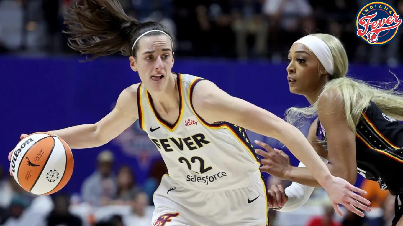 Caitlin Clark of the Indiana Fever dribbles against DiJonai Carrington of the Connecticut Sun in Uncasville, Conn., on Tuesday.