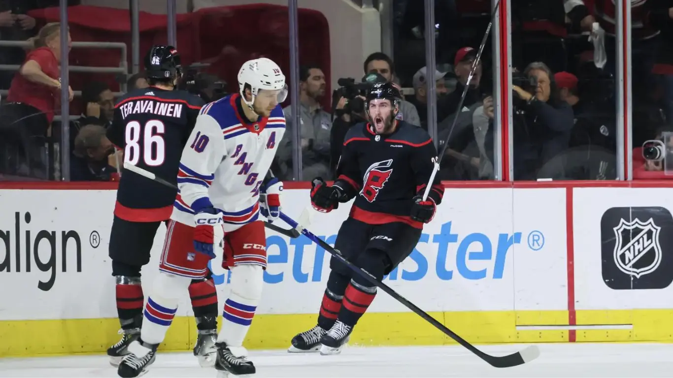 Artemi Panarin skates away while Stefan Noesen (23) celebrates with Teuvo Teravainen (86) after scoring a goal during the Rangers’ 4-3 Game 4 loss to the Hurricanes.