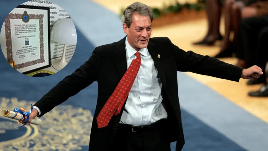 U.S. writer Paul Auster gestures after he received the Prince of Asturias award for Letters during a traditional ceremony at Campoamor theatre in Oviedo, northern Spain, October 20, 2006.