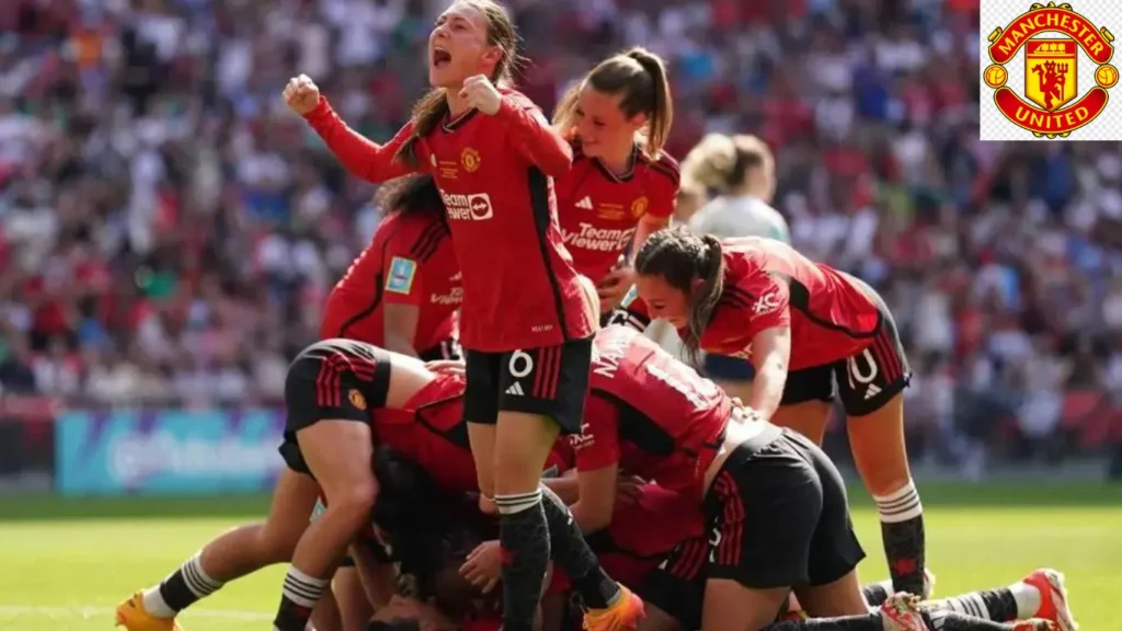 Manchester United's Rachel Williams (bottom) celebrates scoring their side's second goal of the game.