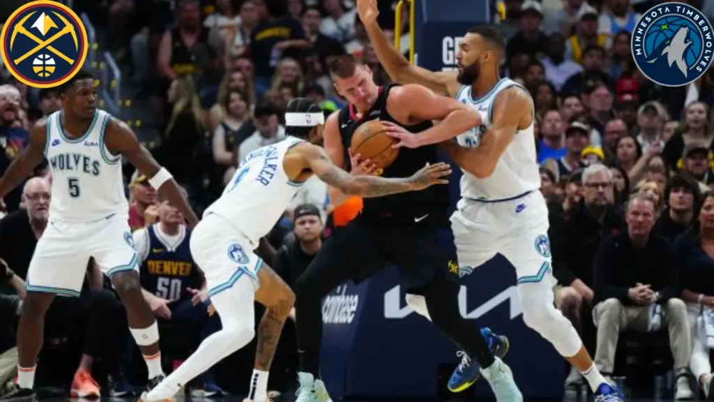 innesota Timberwolves guard Anthony Edward, left, runs down the court after making a 3-point shot against the Denver Nuggets during the first half of Game 6 of an NBA basketball second-round playoff series Thursday, May 16, 2024, in Minneapolis.