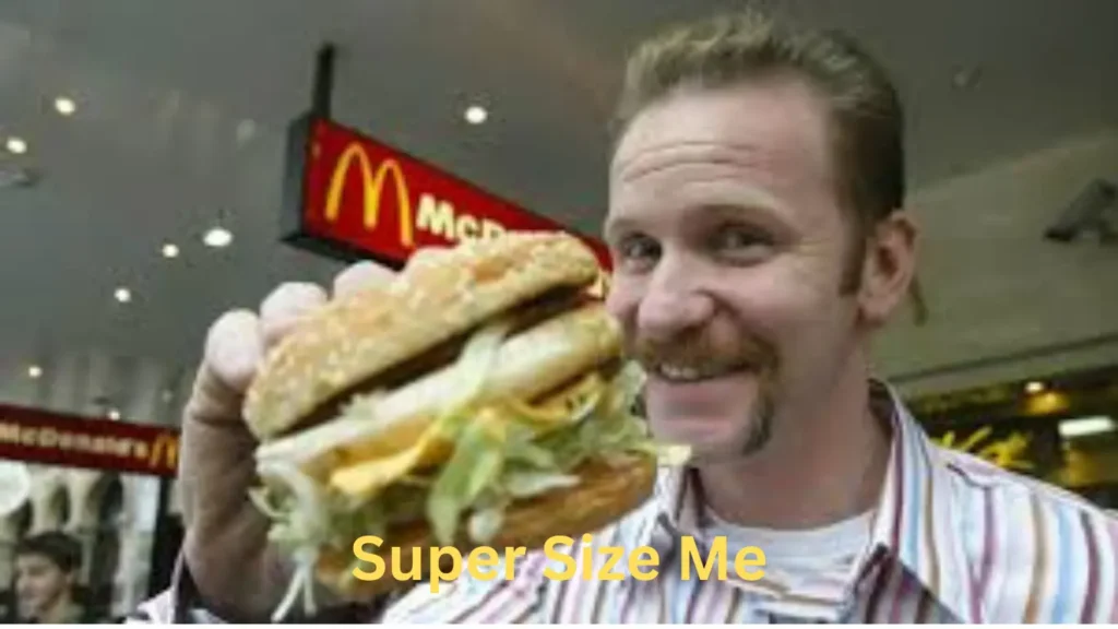 Morgan Spurlock with Macdonald's Burger. 