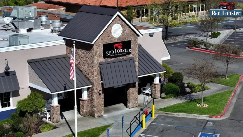 In an aerial view, a sign is posted on the exterior of a Red Lobster restaurant in Rohnert Park, California. Red Lobster is considering filing for Chapter 11 bankruptcy to address rising labor costs and in hopes of renegotiating property leases.