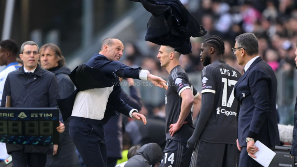 Max Allegri throwing a jacket.