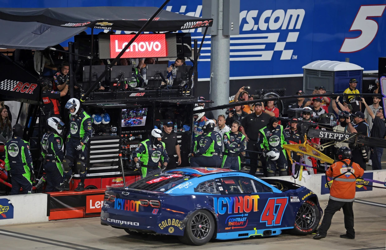 Ricky Stenhouse Jr.'s car ended up parked in Kyle Busch's pit area after an on-track incident during the NASCAR Cup Series All-Star Race.