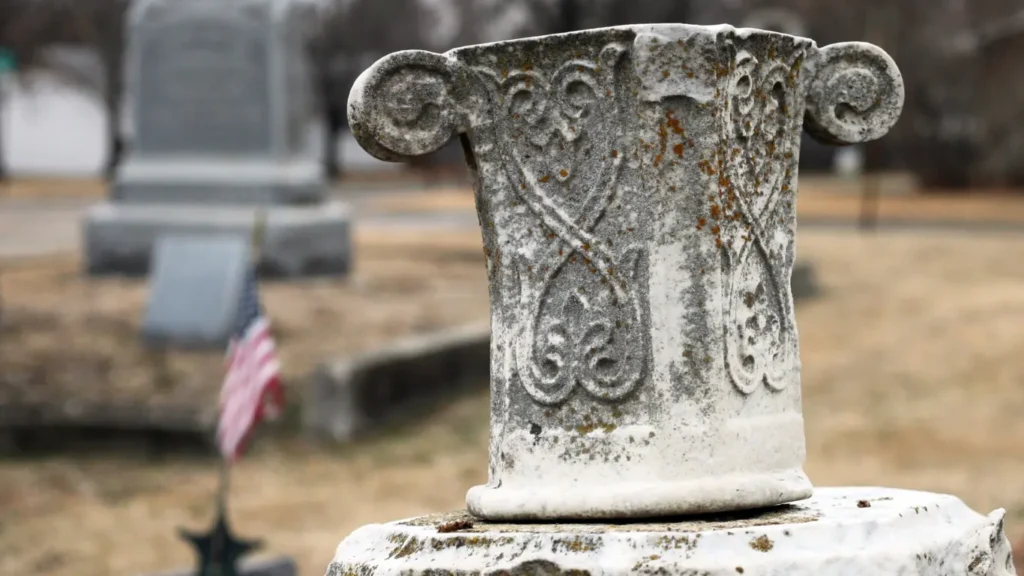 A decoration embellishes a grave at a cemetery in Emporia.