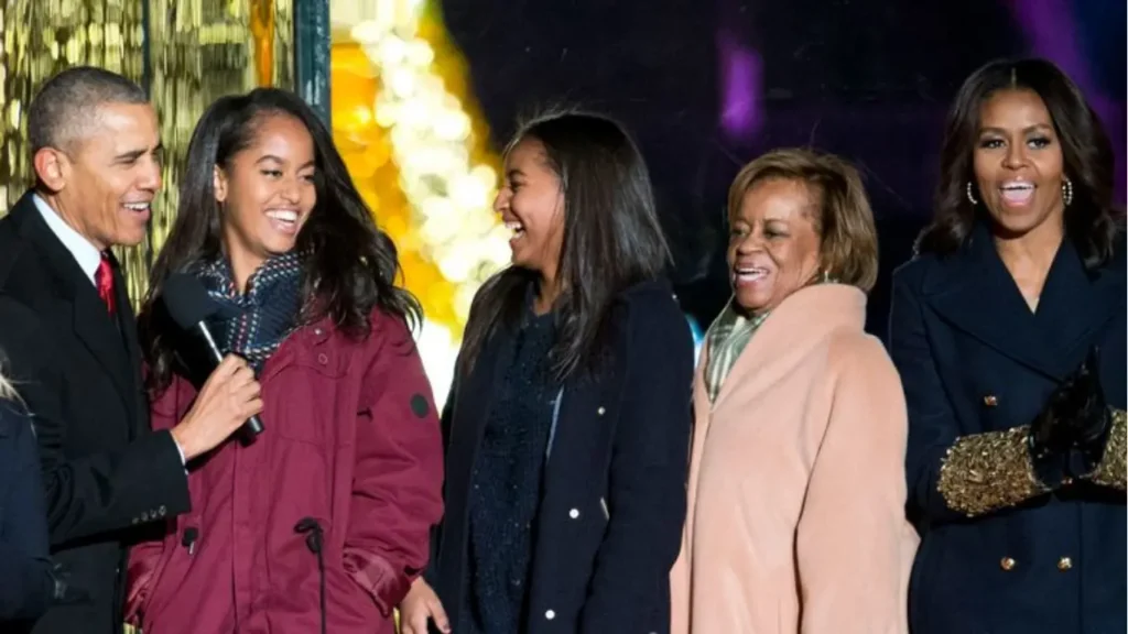 Marian Lois Robinson with her daughter and Barack Obama.